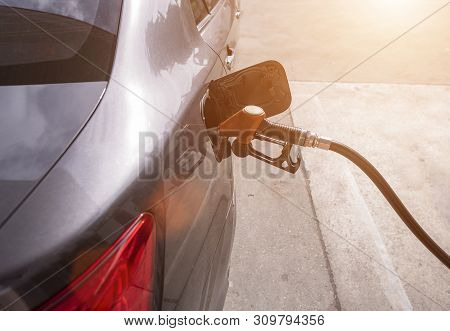 Car Refueling Gasoline At Gustation On Morning