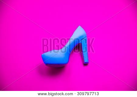Blue High Heeled Shoes On Pink Purple Background - Top View - Heel Profile