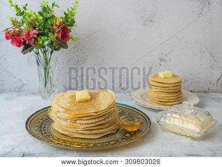 Moroccan Pancakes Baghrir Beghrir Or Crapes With 1000 Holes Served With Honey And Butter On Grey Bac