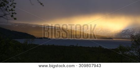 Fantastic Cloud Formations Over Lake Tornetrask In Sweden