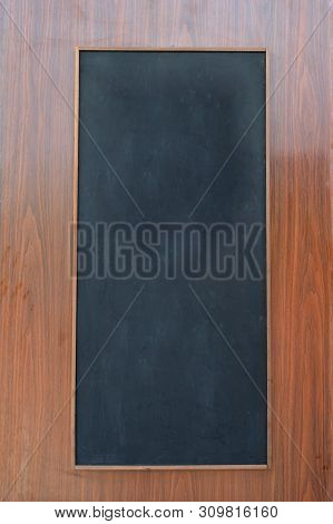 Space Empty Black Chaklkboard On Wooden Wall
