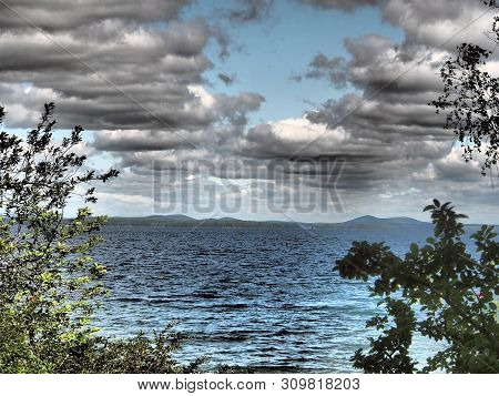 Heavy Gray Clouds Over The Lake On A Cloudy Evening, The Southern Urals, Lake Uvildy