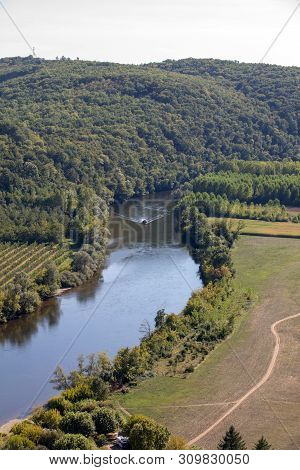 A Tourist Boat, In French Called Gabare, On The River Dordogne At La Roque-gageac, Aquitaine, France