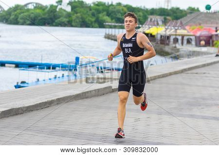 Dnipro, Ukraine - June 08, 2019: Tsikhan Shchamialiou (third Place) Running On An City Embankment Du
