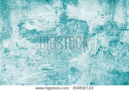 Turquoise Shabby Concrete Wall With Flaky Plaster. Torn Rough Old Texture. Vintage, Cracked Distress