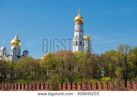 View Of The Moscow Kremlin, The  Assumption Belfry And Cathedrals On Cathedral Square On A Summer Da