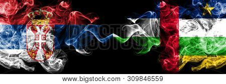 Serbia Vs Central African Republic Smoky Mystic Flags Placed Side By Side. Thick Colored Silky Smoke
