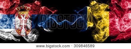 Serbia Vs Chad, Chadian Smoky Mystic Flags Placed Side By Side. Thick Colored Silky Smokes Combinati