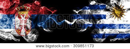 Serbia Vs Uruguay, Uruguayan Smoky Mystic Flags Placed Side By Side. Thick Colored Silky Smokes Comb