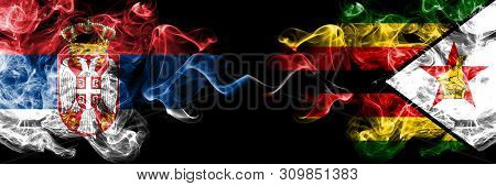 Serbia Vs Zimbabwe, Zimbabwean Smoky Mystic Flags Placed Side By Side. Thick Colored Silky Smokes Co