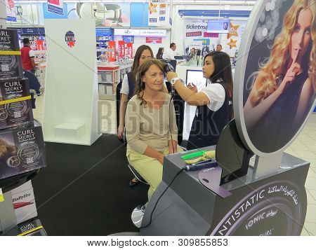 Dubai, United Arab Emirates, January 3, 2016. A Woman Participates In An Advertising Campaign And Si
