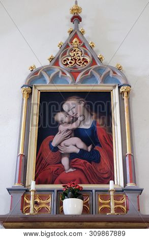 PETSCHIED, ITALY - JULY 14, 2018: Virgin Mary altar in the Saint Nicholas church in Petschied near Luson, Italy