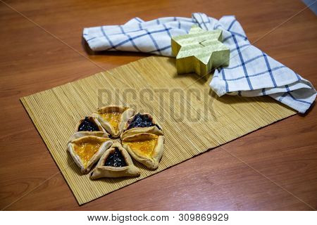 Hamantash Purim Blueberry And Apricot Jam Cookies With Wooden Table Background And David Star Shape