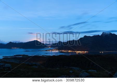 Lofoten Landscape During Night With The Rising Moon Near Fredvang.