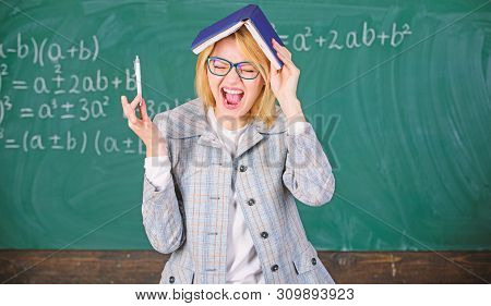 Keep In Memory. Improve Memory Skill. Woman Teacher With Book As Roof On Head. Memorizing Method. Tr