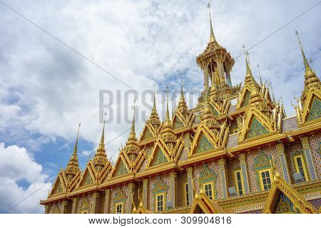 Golden Castle At Wat Chantharam (wat Tha Sung) Uthaithani ,thailand An Old Temple Decorated With Bea
