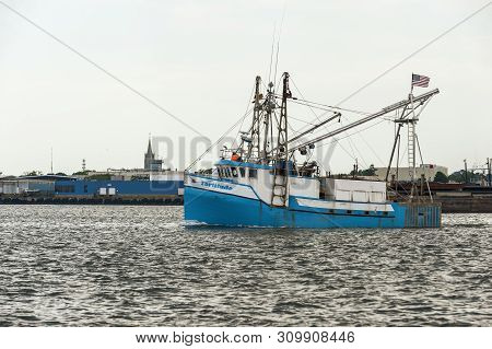 New Bedford, Massachusetts, Usa - July 4, 2019:  Commercial Fishing Vessel Fortitude Crossing New Be