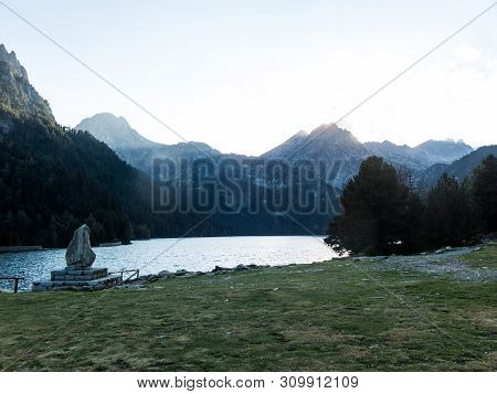 The Last Rays Of Sun On The Pond Of Sant Maurici, In The Aiguestortes And Sant Maurici National Park