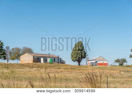 Warden, South Africa - May 1, 2019: A School And A Building On A Farm Between Warden And Vrede In Th