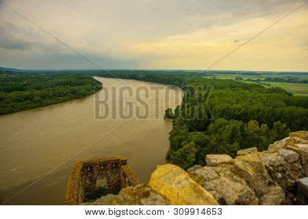 Danube, Bratislava, Slovakia: Beautiful Landscape With Devin Castle, Mountais And Danube River.