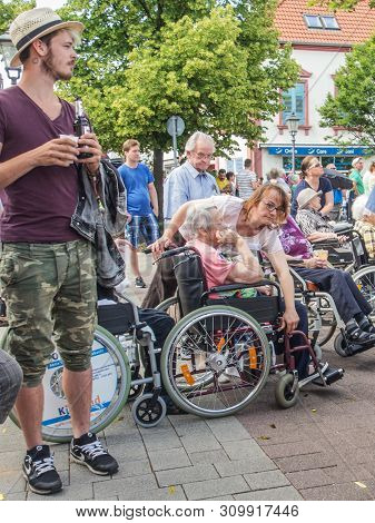 Kirchheimbolanden,rheinland-pfalz,germany-06 23 2019: Elderly People From Nursing Home Waiting For P