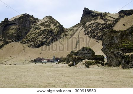 Old Stone House Destroyed Ancient Viking Overgrown With Yellow Dry Grass In Iceland