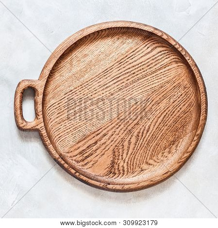 Empty Round Wooden Dish On Grey Concrete Background, Square, Copy Space For Your Text