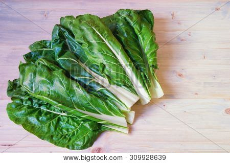 Balkan Cuisine. Blitva ( Chard Leaves ) - Popular Leafy Vegetables. White Rustic Background, Free Sp