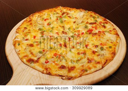 Pizza On The Thin Dough With Cheese