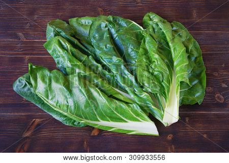 Balkan Cuisine. Blitva ( Chard Leaves ) - Popular Leafy Vegetables - On Dark Rustic Background