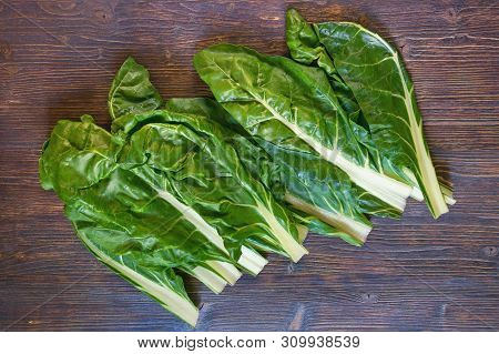 Balkan Cuisine. Blitva ( Chard Leaves ) - Popular Leafy Vegetables. Dark Rustic Background