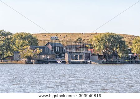 Vrede, South Africa - May 1, 2019: Holiday Homes Next To The Dam At Vrede, In The Free State Provinc