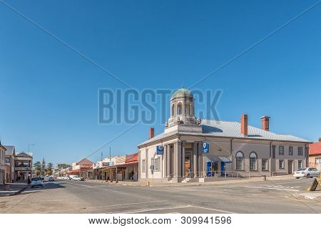 Vrede, South Africa - May 1, 2019: A Street Scene, With Businesses, People And Vehicles, In Vrede, I