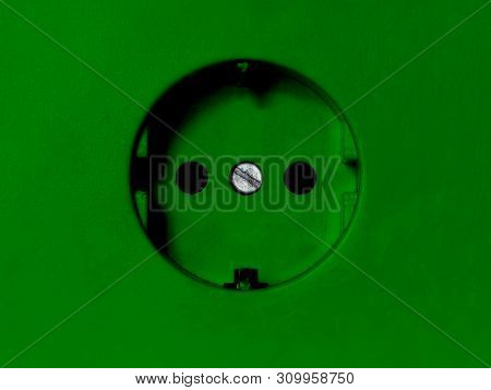 Electricity Environmental Concept: Dirty Green Type F Power Socket