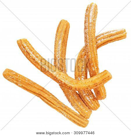 Churro Isolated On White Background. Mexican And Spanish Cuisine. Stacked Churros With Sugar, Top Vi