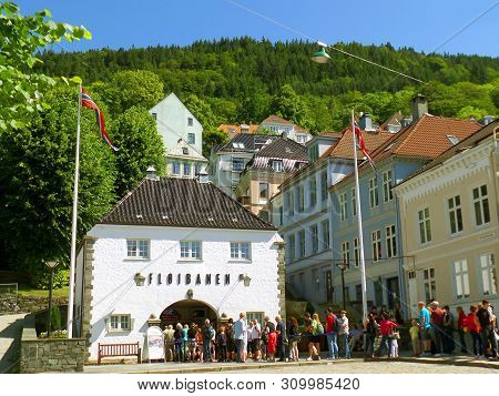 Many Of Visitors Queuing At The Floibanen Funicular Station For The Rides To Mount Floyen In Bergen,
