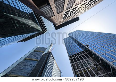 Frankfurt, Germany. July 2019.  Modern Skyscrapers In The Financial District Seen From Below.