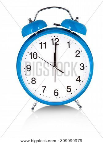 Blue Alarm Clock On A White Background. A Wake White Dial