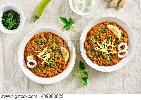 Keema Curry In Bowl Over Light Background. Indian And Pakistani Style Dish. Top View, Flat Lay