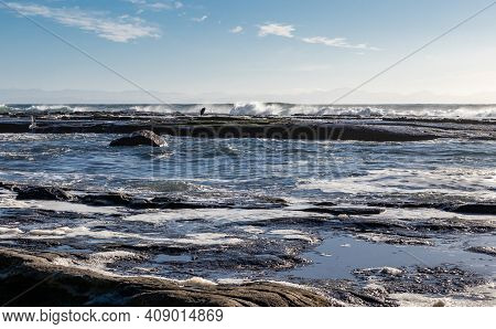Waves Crashing On The Rocks In The Juan De Fuca Strait, British Columbia, Canada