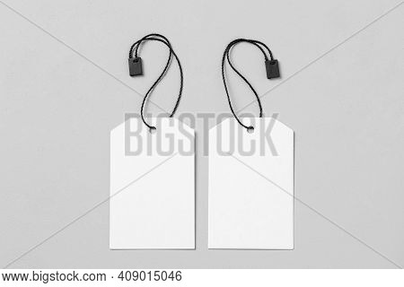 White Empty Label On Black Cloth Background