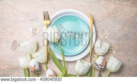 Easter Table Setting With Floral Decor On Grey Table. Elegance Dinner. Top View. Happy Easter Backgr
