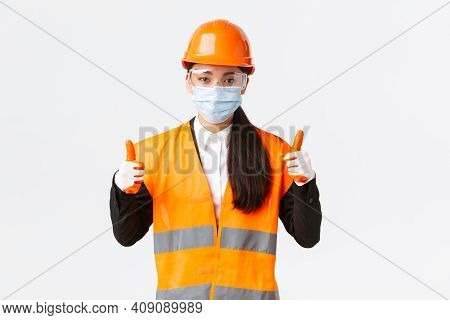 Covid-19 Safety Protocol At Enterpise, Construction And Preventing Virus Concept. Confident Female A