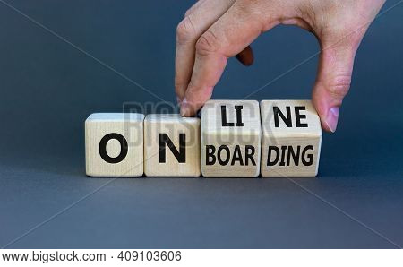 Online Onboarding Symbol. Businessman Turns Wooden Cubes With Words 'online Onboarding'. Beautiful Y