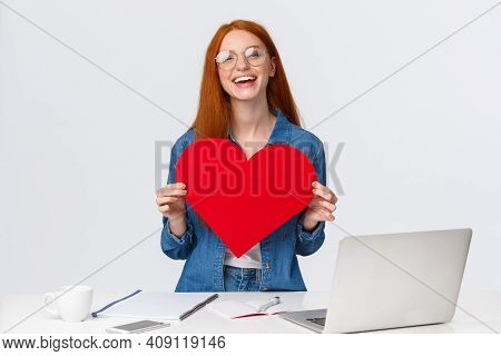 Valentines Day, Creativity And Feelings Concept. Cheerful Smiling Redhead Girl With Long-distance Re