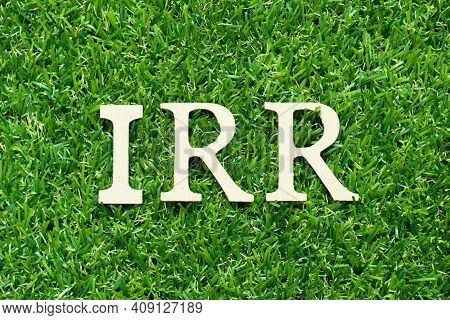Alphabet Letter In Word Irr (abbreviation Of Internal Rate Of Return) On Green Grass Background