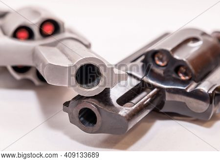 Two Snub Nose Revolvers, A Black 38 Special And A Stainless 44 Special Both Loaded With Hollow Point