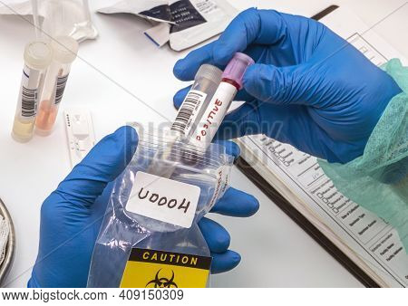 Nurse Analyses Positive Pcr Tests Of Covid-19 In A Hospital Laboratory, Conceptual Image