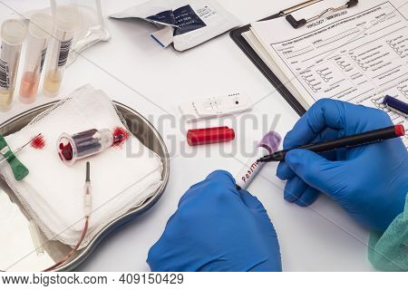Nurse Analyses Positive Pcr Tests Of Covid-19 In A Hospital Laboratory, Conceptual Image