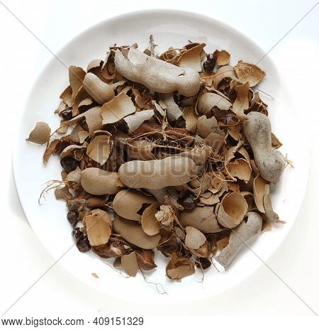 Tamarind Tree Produces Brown, Pod-like Fruits That Contain A Sweet, Tangy Pulp